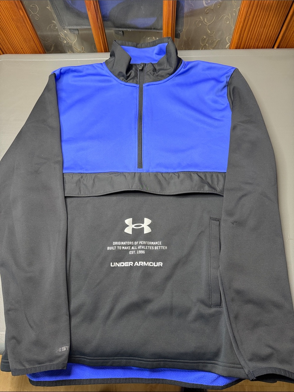 Men’s Under Armour Black and Blue (or purple) Half-Zip Performance Pullover. LG
